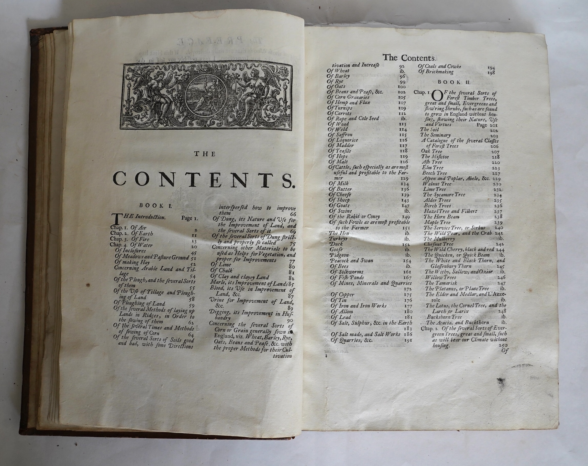 Laurence, John - A New System of Agriculture. Being a complete body of husbandry and gardening....1st edition. frontis. 2 plates, engraved text illus., head and tailpiece decorations; contemp. blind decorated panelled ca